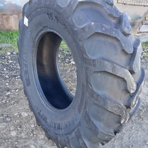 Шины на погрузчик-экскаватор 16.9-24 B.M/T 12PR TL TIANLI